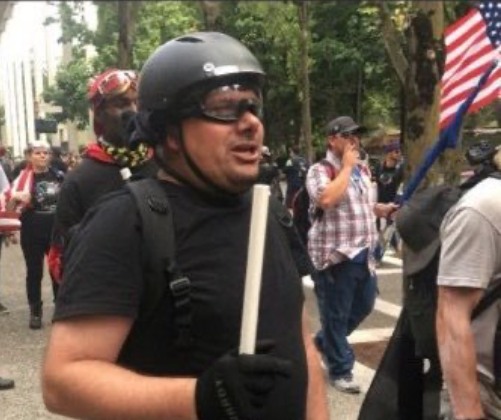 Sahady in riot gear at a march