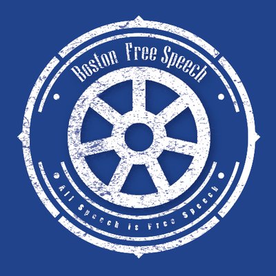 White logo on blue background. Text reading "Boston Free Speech, All Speech is Free Speech" is ringed around to concentric circles connected by seven spokes. Addional cicular designs are aroudn the text. The image is made to look weathered like paint.