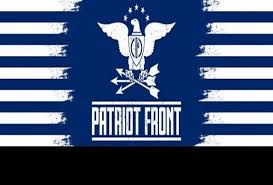 Image of an eagle with wings outstretched clutching arrows similar to images used by the US government above the text “Patriot Front.” Eagle has a shield with a fasces, a bundle of sticks around an axe, on its chest. Blue background of the image transitions into blue stripes on the side of the image.
