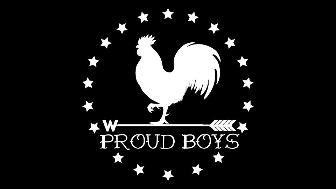 Flag with white logo on black background. Text reads "Proud Boys" and above it is a rooster silhouette styled like a weathervane, standing on top of an arrow pointing left with a "W" where the point should. Encircled by white stars.